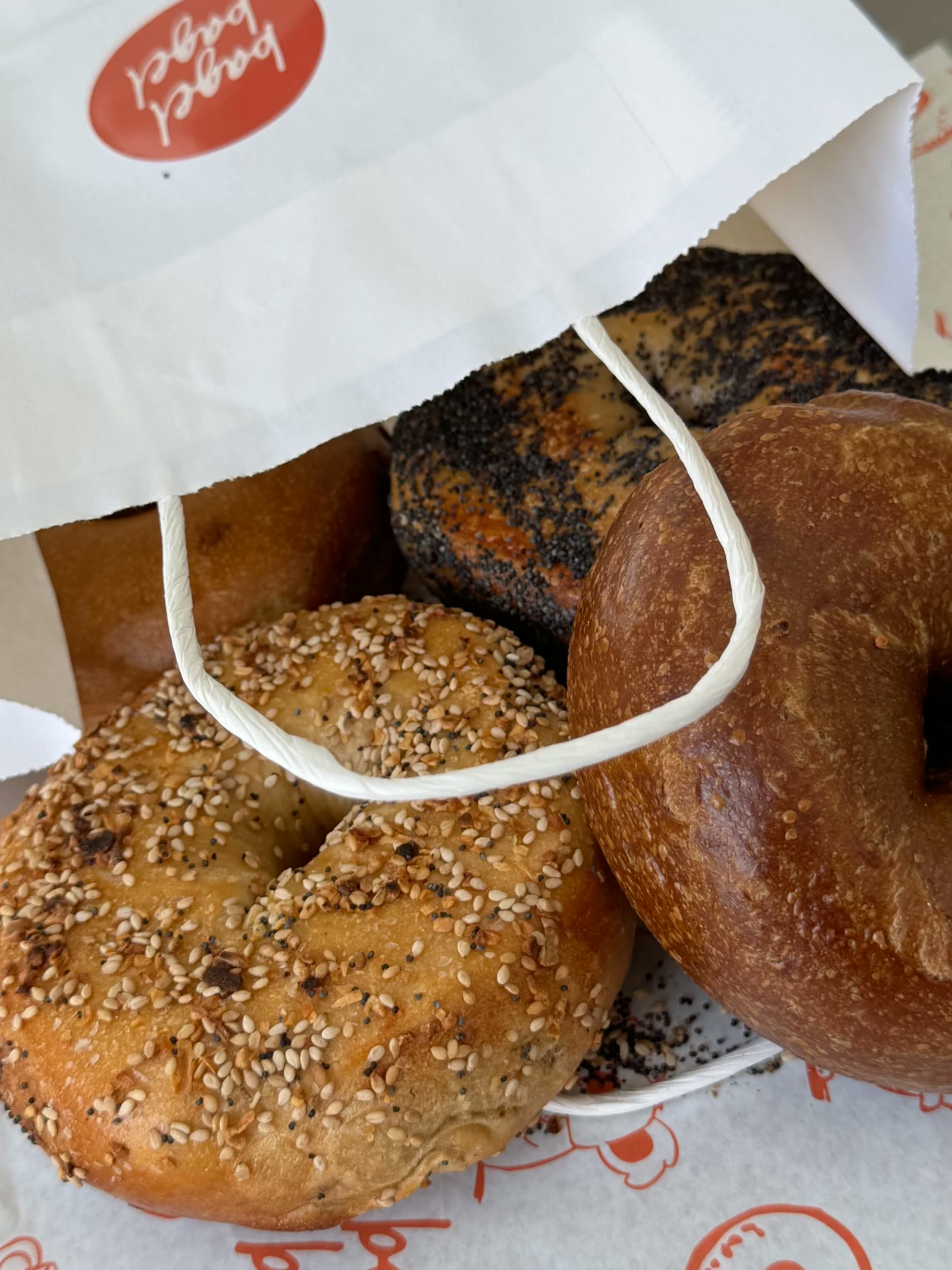a bagel bagel takeout bag ready to go